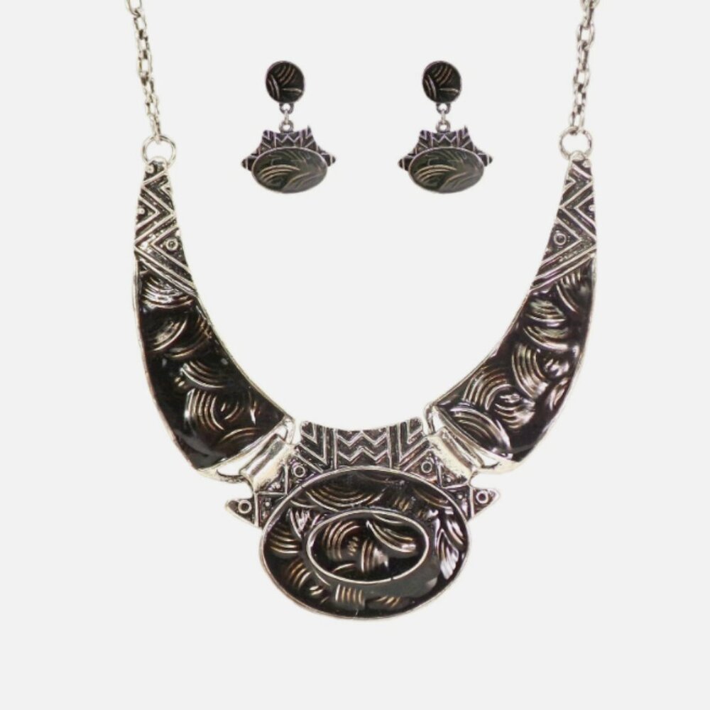 Large black and silver large necklace earring set with textured swirl designs